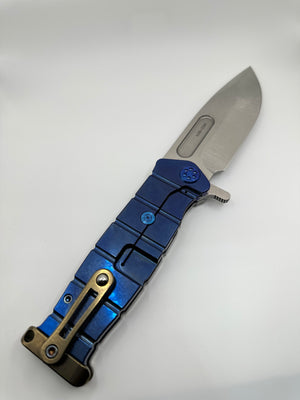 Medford Knife USMC Fighter Flipper S45VN Tumbled Blade, Tumbled Billowing Flag Handle, Blue Spring & HW, Bronze Clip & Pommel - Tristar Edge