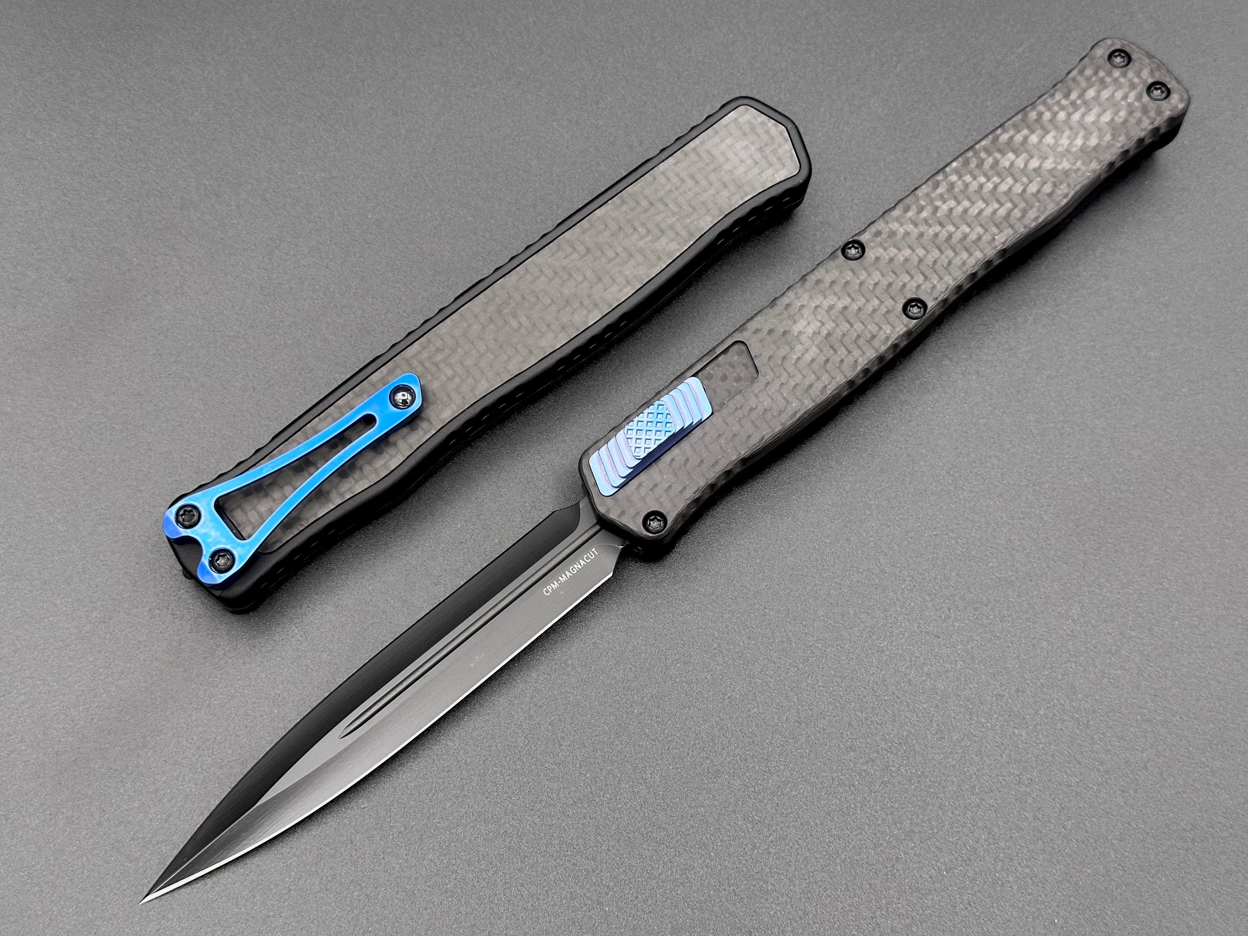 Heretic Knives Cleric II Carbon Fiber top/CF Inlay, DLC Double Edge, black hardware, and Blue Ti Clip and Button - Tristar Edge
