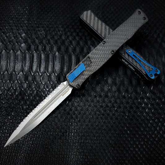 Pre-Order: Heretic Knives Cleric II Carbon Fiber top/CF Inlay, Stonewash Double Edge Full Serrated, black hardware, and Blue Ti Clip and Button - Tristar Edge