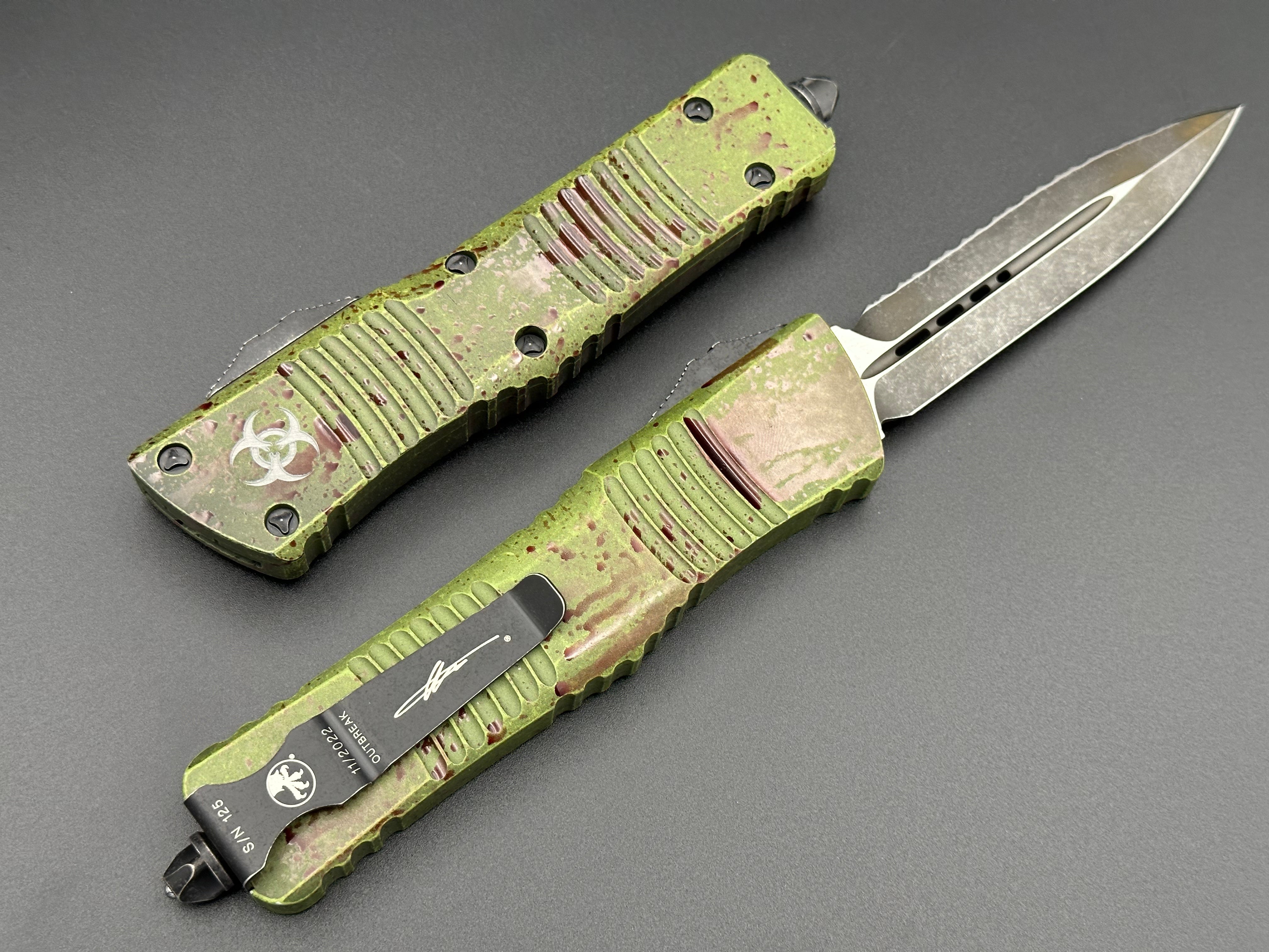 Combat Troodon D/E Outbreak Signature Series Deep Engraved Full Serrated 142-3 OBDS - Tristar Edge