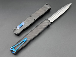 Heretic Knives Cleric II Carbon Fiber top/CF Inlay, Stonewash Double Edge, black hardware, and Blue Ti Clip and Button - Tristar Edge